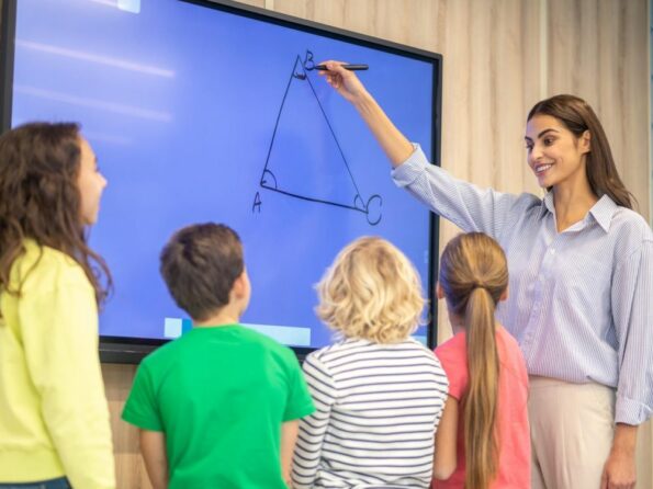 Teacher Drawing Triangle At Smartboard 1000X750 001